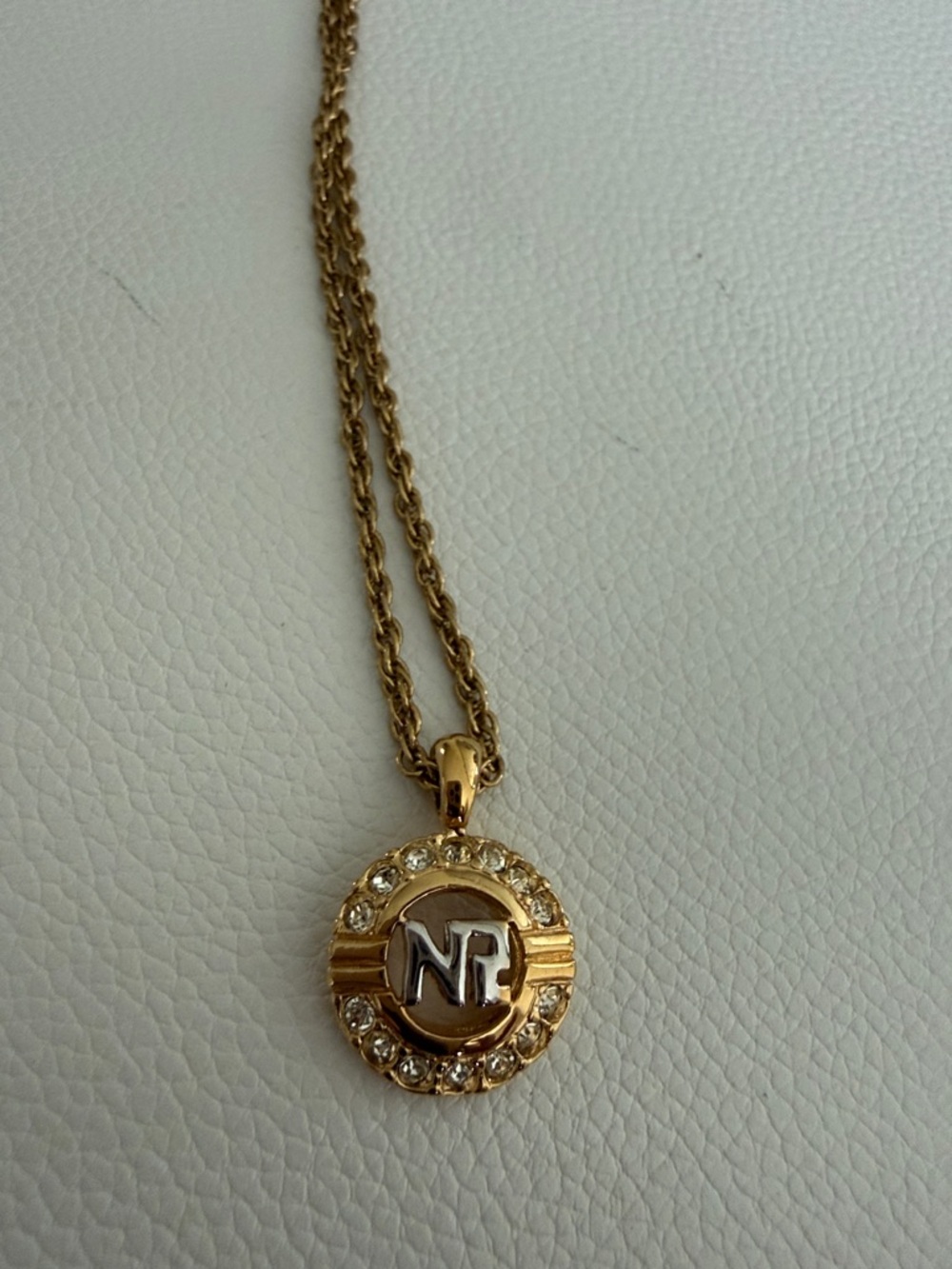 Authentic Nina Ricci Gold-Tone Round Pendant Necklace with Crystal Accents